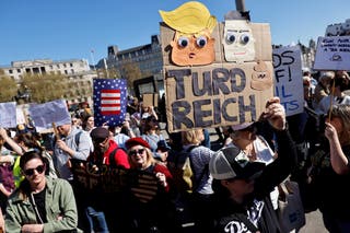 A ‘Turd Reich’ placard being held during an anti-Trump protest in London